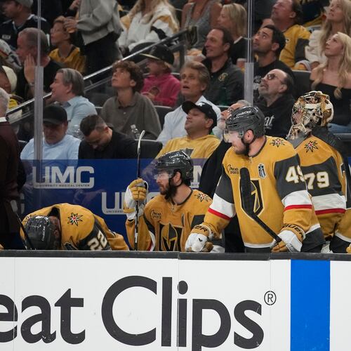 Vegas Golden Knights players watch from the bench during the third period in Game 6 of the NHL hockey Stanley Cup Final series against the Carolina Hurricanes, Sunday, June 14, 2026, in Las Vegas. (AP Photo/John Locher)