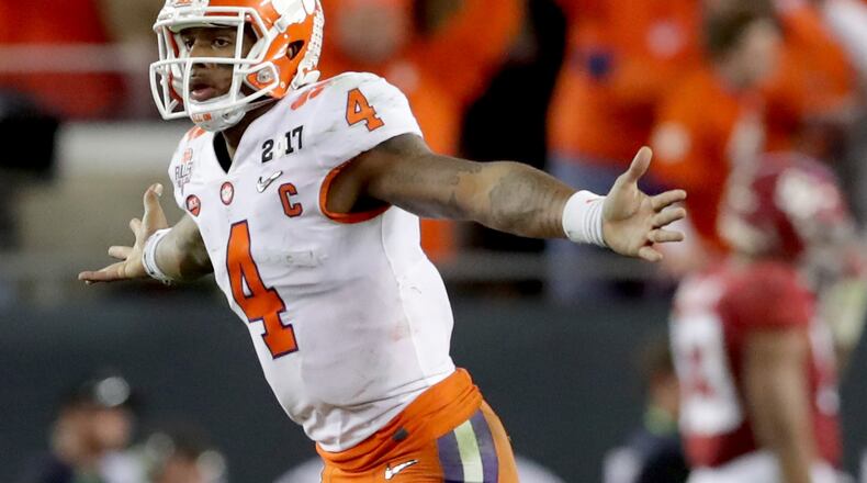 Clemson quarterback Deshaun Watson, from Gainesville, celebrates after throwing a 2-yard touchdown pass to beat Alabama and win the national championship Monday night. (Photo by Streeter Lecka/Getty Images)
