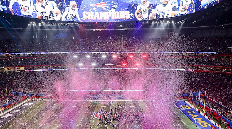 Confetti falls onto the field after Super Bowl LIII.