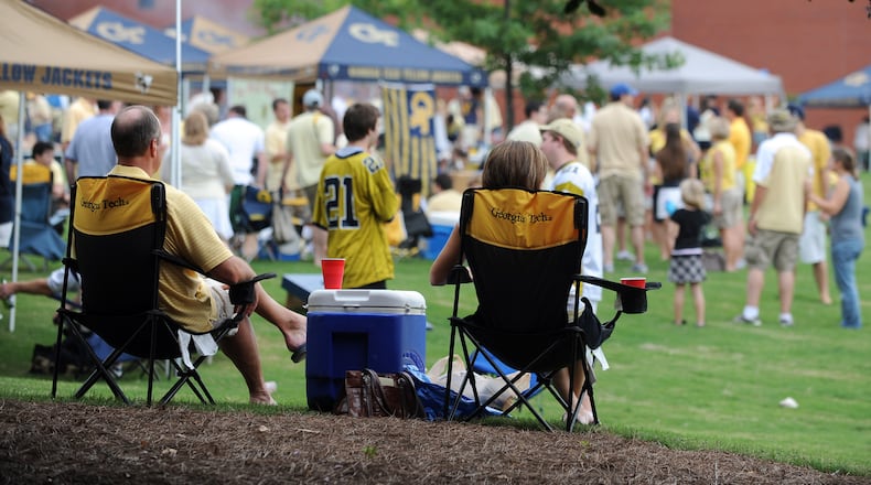 Tailgating before a Georgia Tech football game on its campus. AJC FILE PHOTO