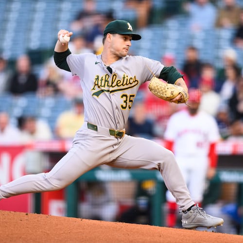 Athletics pitcher J.T. Ginn delivers during the first inning of a baseball game against the Los Angeles Angels, Monday, May 18, 2026, in Anaheim, Calif. (AP Photo/William Liang)