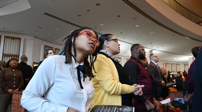 The audience reacts during the 57th Martin Luther King, Jr. Beloved Community Commemorative Service at Ebenezer Baptist Church, Monday, January 20, 2025, in Atlanta. (Hyosub Shin / AJC)