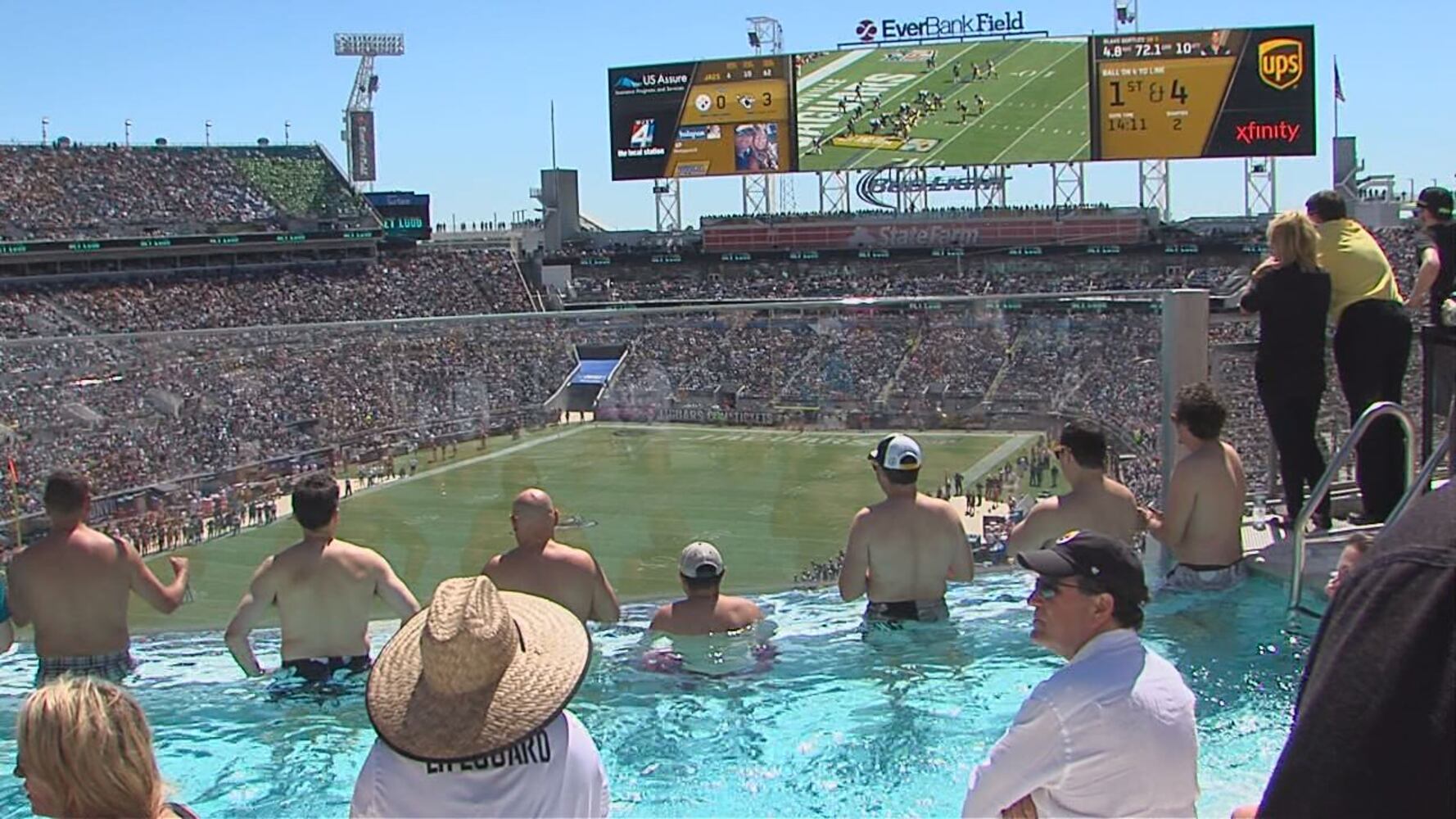 Watching the Jaguars game from the pool deck
