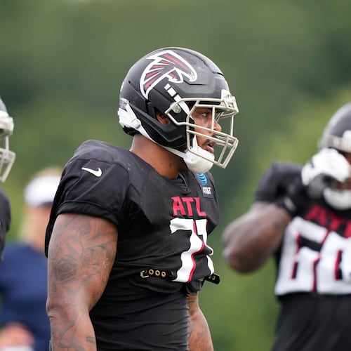Atlanta Falcons offensive tackle Elijah Wilkinson runs drills during an NFL joint football practice with the Tennessee Titans on Tuesday, Aug. 12, 2025, in Flowery Branch, Ga. (Brynn Anderson/AP)