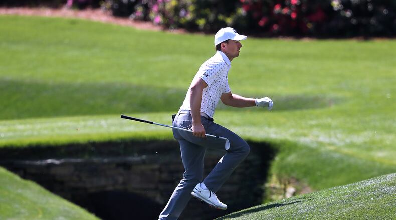 Jordan Spieth runs across the tributary to Rae’s Creek to the 13th green during his practice round for the Masters at Augusta National Golf Club on Tuesday, April 6, 2021, in Augusta. Rae's Creek winds through the National at Amen Corner, the famous stretch of holes that is often instrumental in deciding the Masters winner. A tributary runs up the left side of the 13th fairway and in front of the green.  Curtis Compton / Curtis.Compton@ajc.com