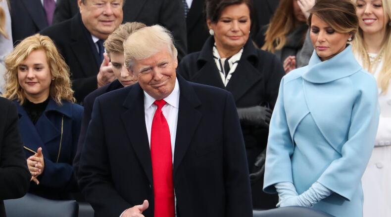 President Donald Trump flashes a thumbs up during the 58th Presidential Inauguration at the U.S. Capitol in Washington, Friday, Jan. 20, 2017. (AP Photo/Andrew Harnik)