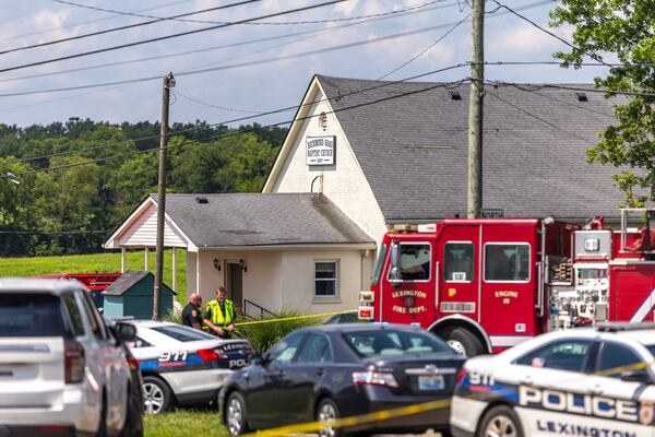 Law enforcement members respond to a shooting near Richmond Road Baptist Church in Lexington, Ky., Sunday, July 13, 2025. (Ryan C. Hermens/Lexington Herald-Leader via AP)