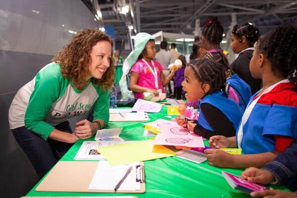 Amy Dosiks, CEO of Girl Scouts of America in Atlanta, joins in with Daisy Girl Scouts as they work toward badges like Space Science Explorer, What Robots Do or STEM Career Exploration.