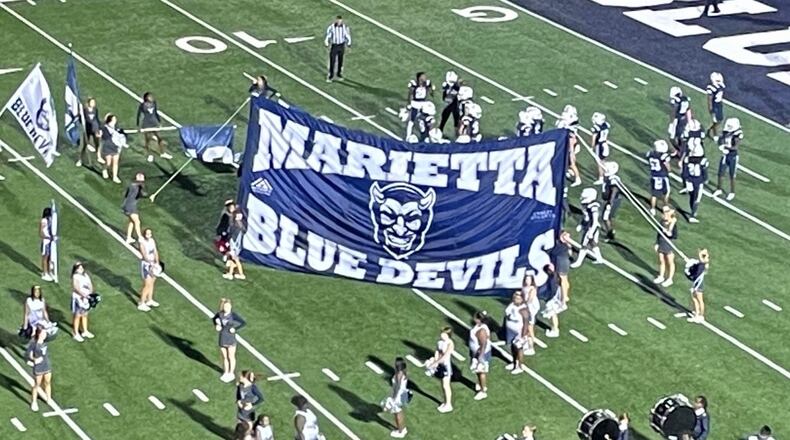 Marietta players prepare to take the field for their game against Harrison at Northcutt Stadium on Oct. 28, 2022. Marietta won 31-7 to remain in first place in Region 3-7A.