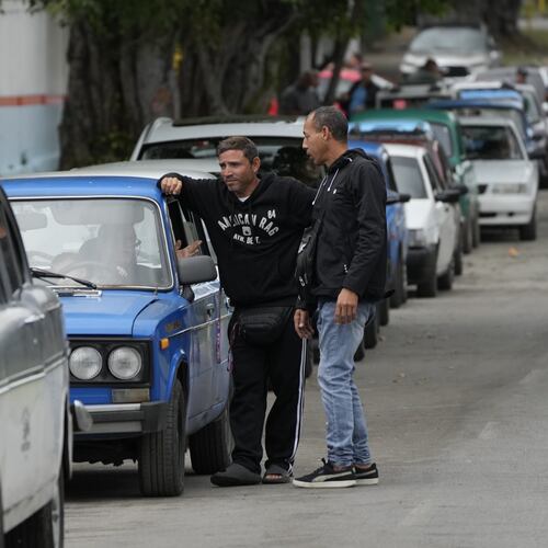 Drivers wait in a long line to enter a gas station in Havana, Cuba, Friday, Jan. 30, 2026. (AP Photo/Ramon Espinosa)
