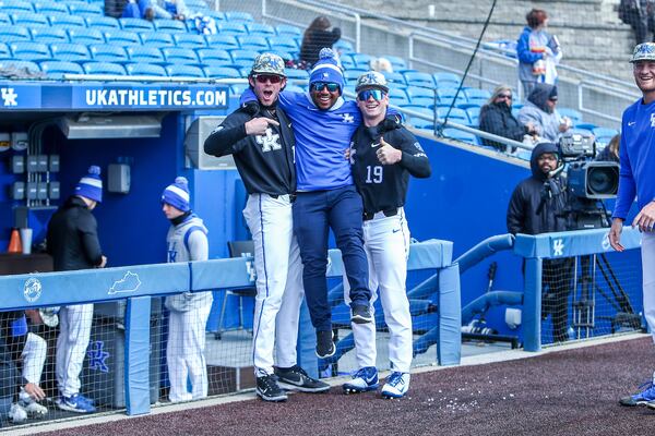 Richie Wells (center) had left his job as a University of Kentucky athletic trainer to sell real estate in Atlanta.  (Photo by Sarah Caputi / UK Athletics)