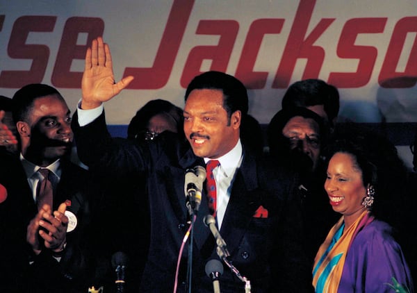 Jesse Jackson, with his wife, Jacqueline, concedes defeat in the Illinois Democratic primary on March 16, 1988, in Chicago. (Lisa Genesen/AP)