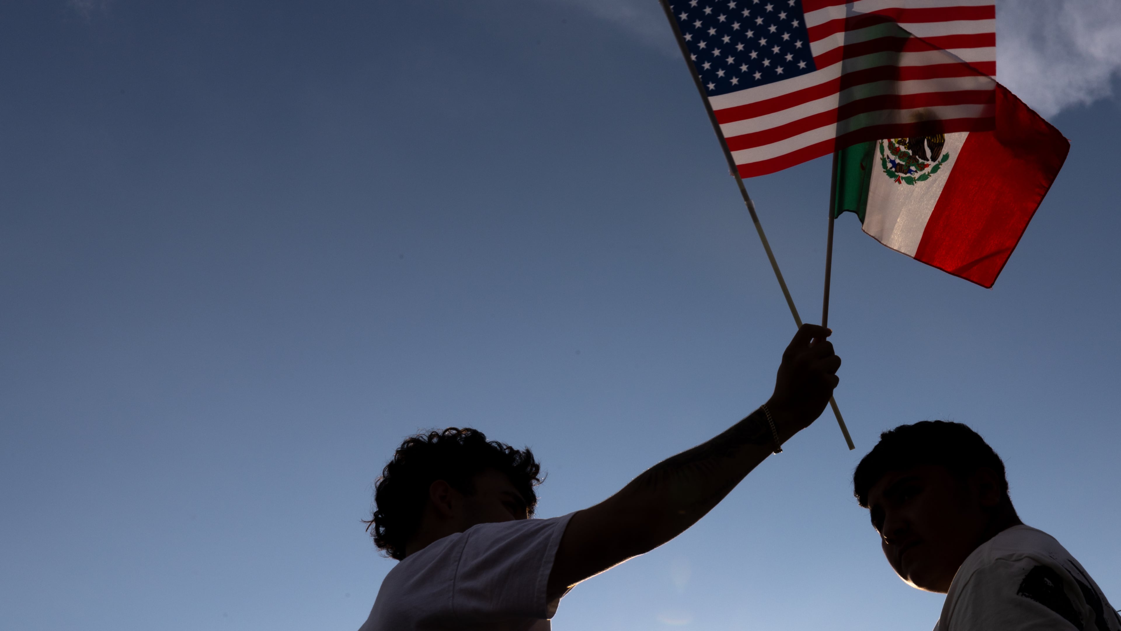Demonstrators protest ICE raids and deportations on Buford Highway in Atlanta on Tuesday, June 10, 2025. (Arvin Temkar/AJC)