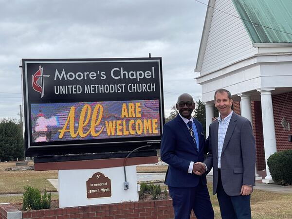 Moore's Chapel UMC pastor Rev. Edward J. Landrum and Rev.  Dr. Robert C. Brown, senior pastor of Carrollton First UMC. The new church will meet in the Moore’s Christian Life Center.
