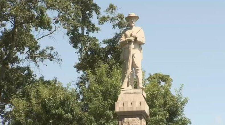 The Henry County Commission on Tuesday voted to remove a Confederate monument on its property in the McDonough Square.
