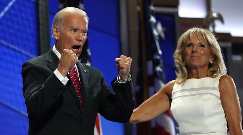 PHILADELPHIA, PA - JULY 27: US Vice President Joe Biden reacts to the crowd as his wife Jill Biden, looks on after delivering remarks on the third day of the Democratic National Convention at the Wells Fargo Center, July 27, 2016 in Philadelphia, Pennsylvania. Democratic presidential candidate Hillary Clinton received the number of votes needed to secure the party's nomination. An estimated 50,000 people are expected in Philadelphia, including hundreds of protesters and members of the media. The four-day Democratic National Convention kicked off July 25. (Photo by Joe Raedle/Getty Images)