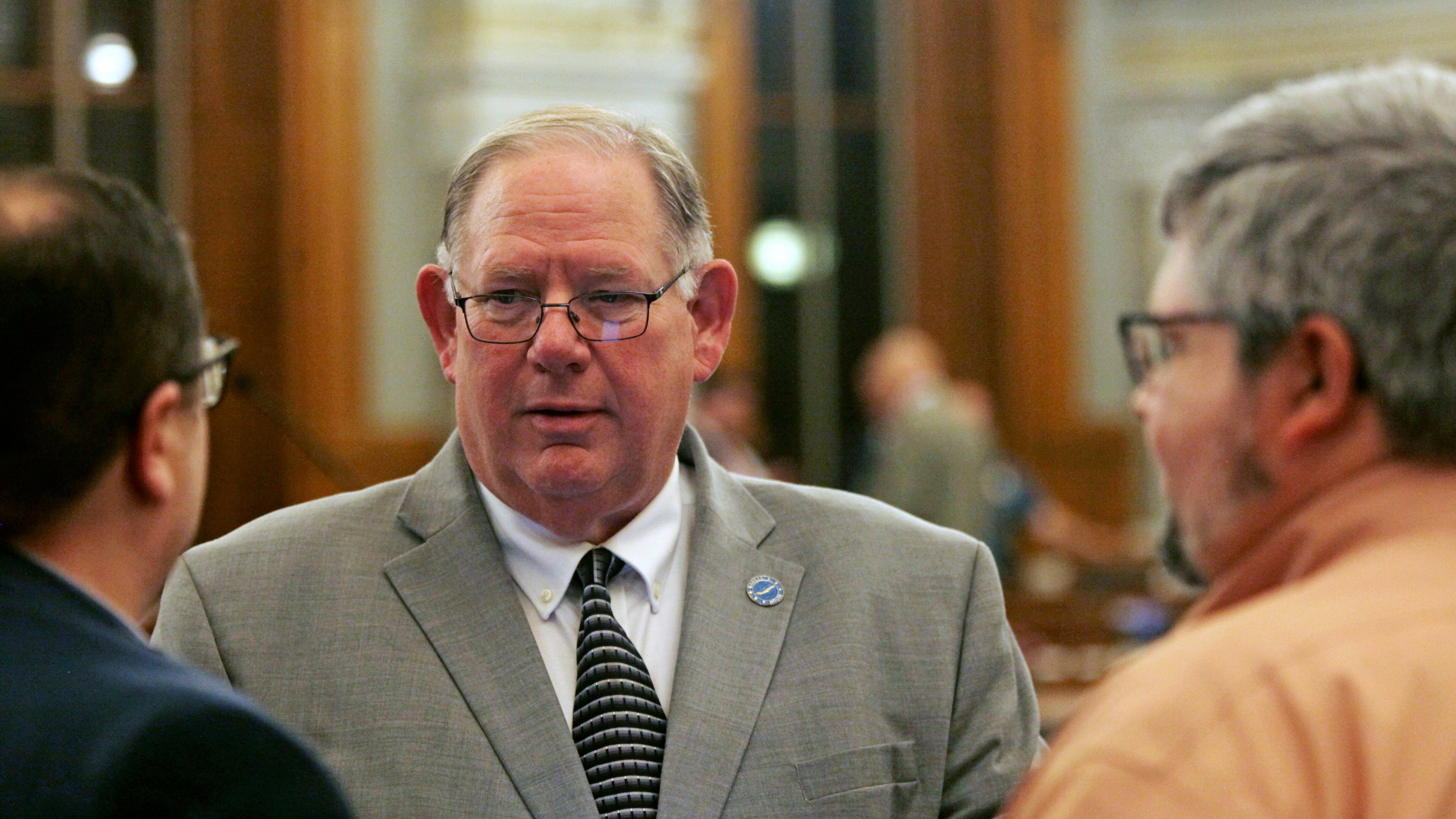 FILE - Kansas House Speaker Dan Hawkins, R-Wichita, speaks to fellow House members and staffers before a House debate April 30, 2024 at the Statehouse in Topeka, Kan. (AP Photo/John Hanna, File)