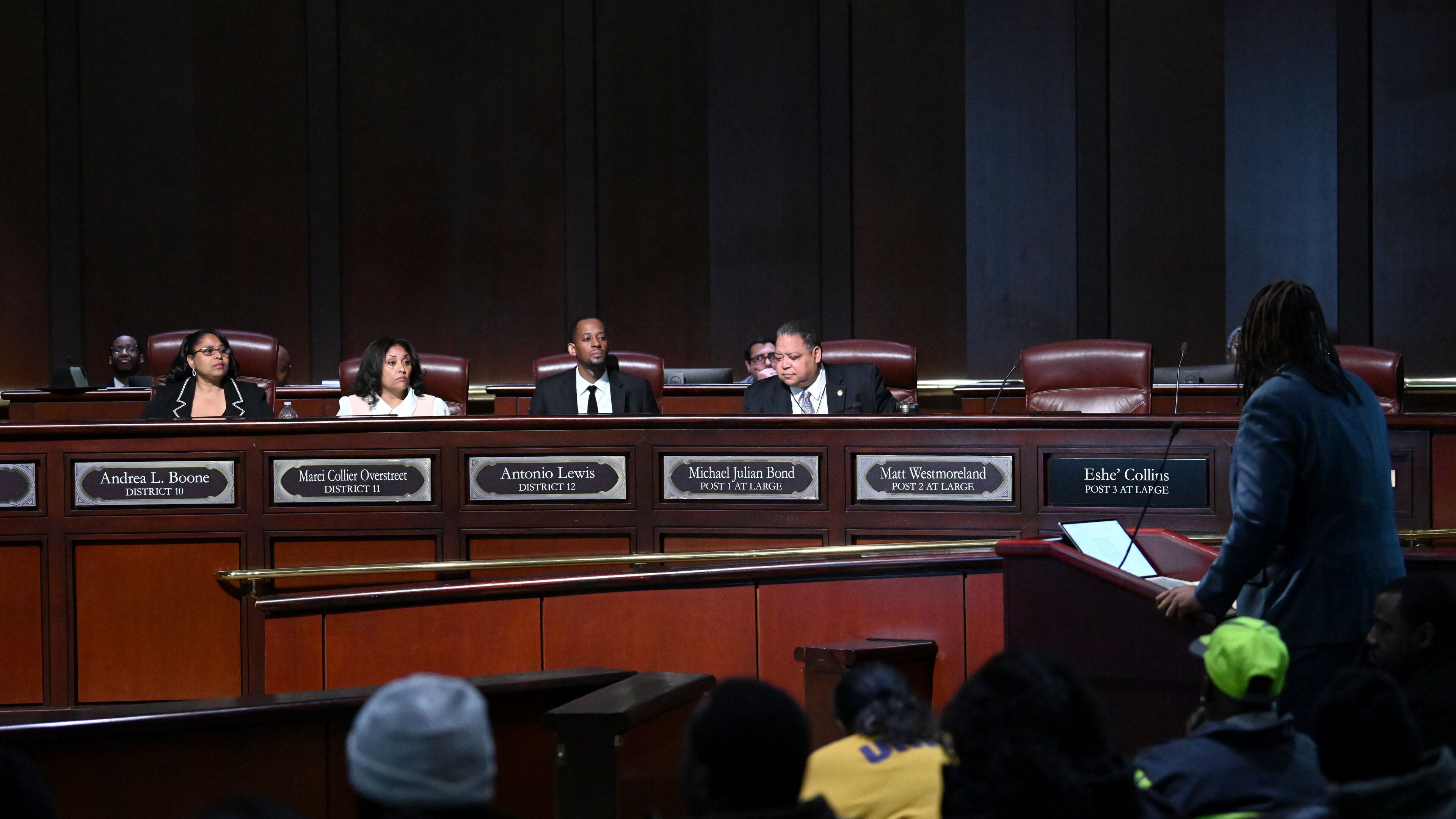 Council members (from left) Andrea Boone, Marci Collier Overstreet, Antonio Lewis and Michael Julian Bond listen to a speaker during public comments at a City Council meeting g a council meeting at Atlanta City Hall, Thursday, January 23, 2025, in Atlanta. (Hyosub Shin / AJC)