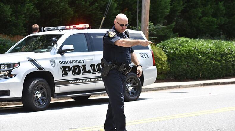Dunwoody police announced the arrests Thursday.