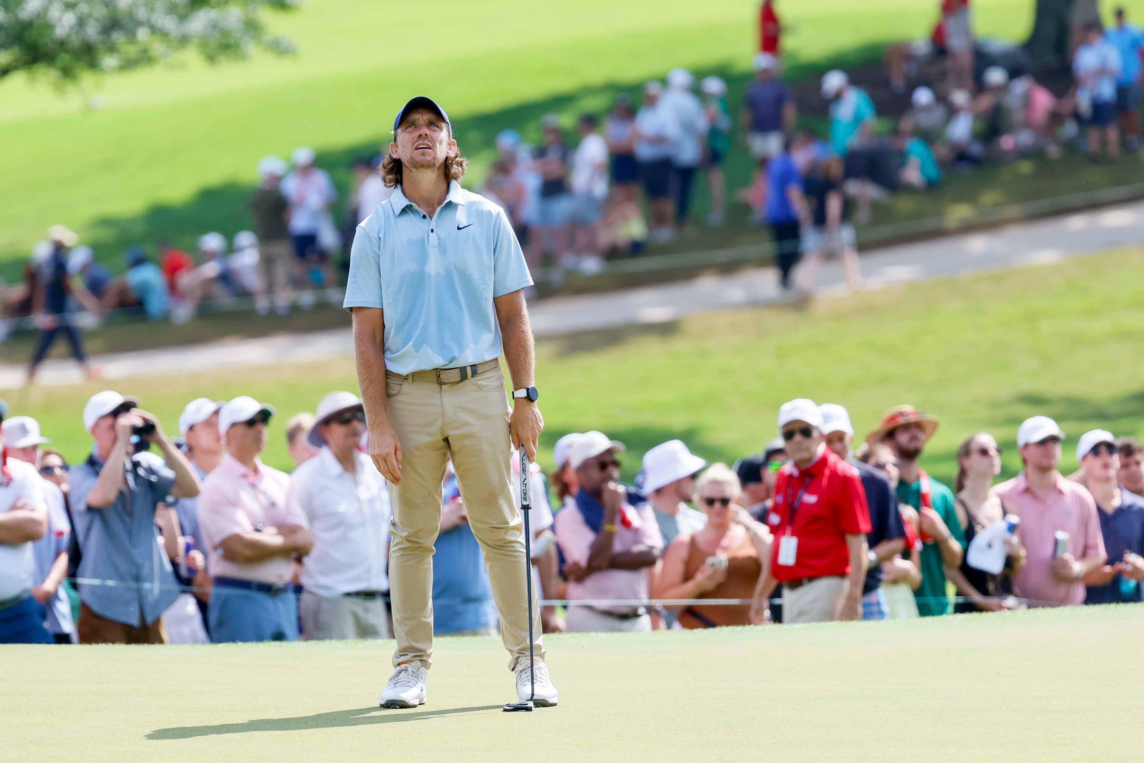 Tommy Fleetwood of England reacts after missing a putt on the 10th hole during the final round of the PGA Tour Championship at East Lake Golf Club, on Sunday, Aug. 24, 2025, in Atlanta. (Miguel Martinez/ AJC)