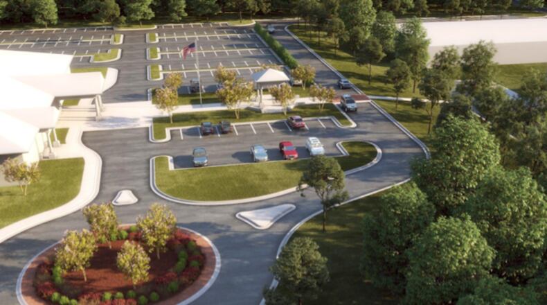 A preliminary concept drawing shows how a road between the library and the new city hall in Fayetteville would provide access but discourage cut-throughs. Courtesy Fayette County