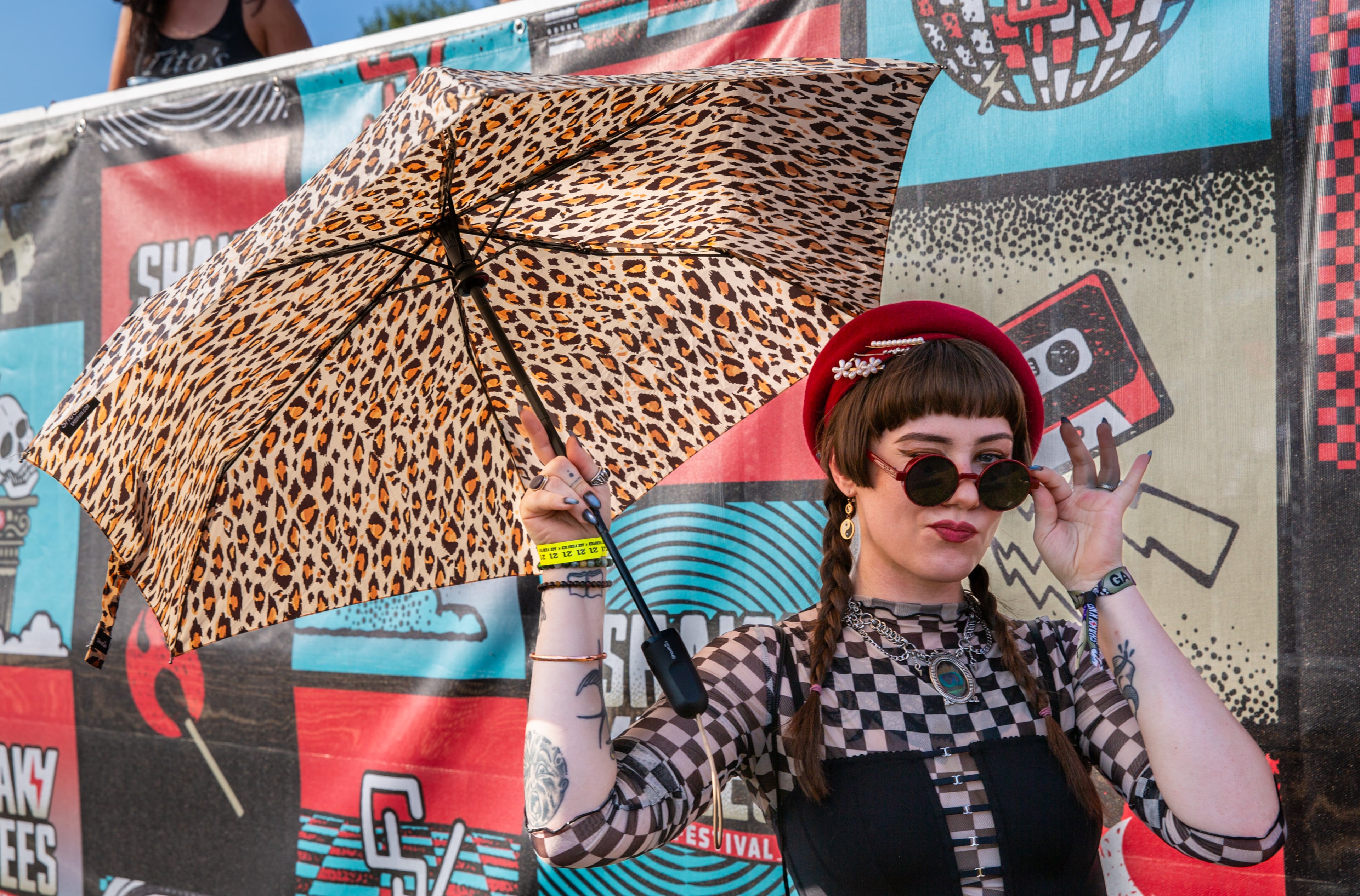 A fan arrives at Piedmont Park for the first day of Shaky Knees on Friday, Sept. 19, 2025, in Atlanta. (Ryan Fleisher for the AJC)