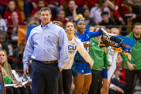 Florida Gulf Coast head coach Karl Smesko watches play on the court during a first-round college basketball game against Oklahoma in the NCAA Tournament, Saturday, March 23, 2024, in Bloomington, Ind. (AP Photo/Doug McSchooler)