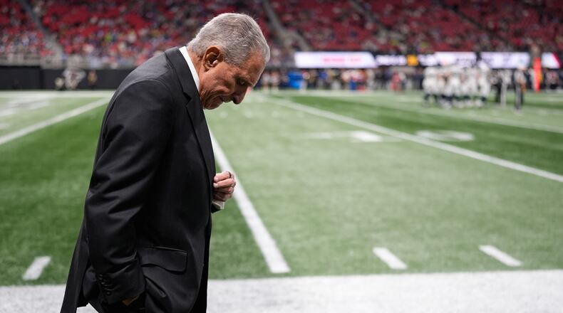 Atlanta Falcons owner Arthur Blank walks on the sideline during the second half of an NFL football game against the Seattle Seahawks, Sunday, Dec. 7, 2025, in Atlanta. The 37-9 loss to the Seahawks dropped the Falcons to 3-9 and ensured their eighth straight losing season. (Mike Stewart/AP)