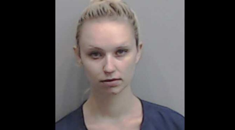 Hali Karlan, who was one of two people charged in the June murder of Elijah Smith, has been released on bond from a Fulton County jail.