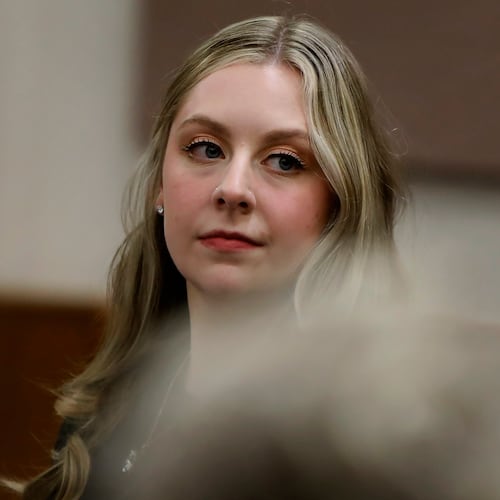 Former Richneck Elementary School teacher Abby Zwerner looks back into the courtroom during her civil lawsuit trial, Tuesday, Oct. 28, 2025, in Newport News, Va. (Stephen M. Katz/The Virginian-Pilot via AP, Pool)