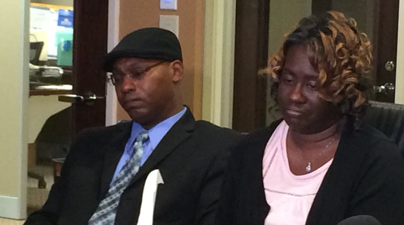 Doug and Joi Partridge spoke about their loved ones who died in a crash in January. (Credit: RAISA HABERSHAM / RAISA.HABERSHAM@AJC.COM)