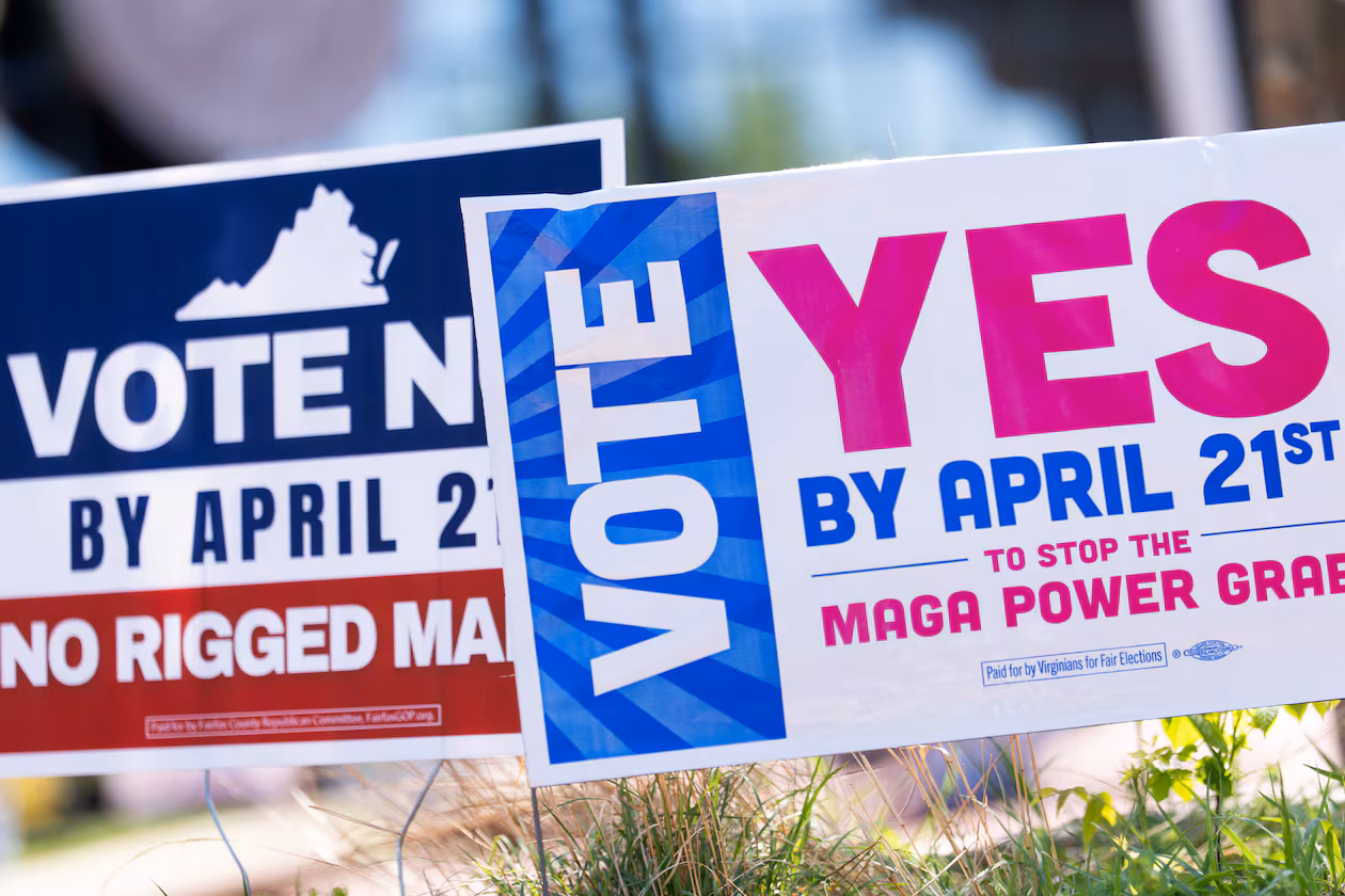 Signs are seen outside Fairfax Government Center during the Virginia redistricting referendum Tuesday, April 21, 2026, in Fairfax, Va. (Julia Demaree Nikhinson/AP)