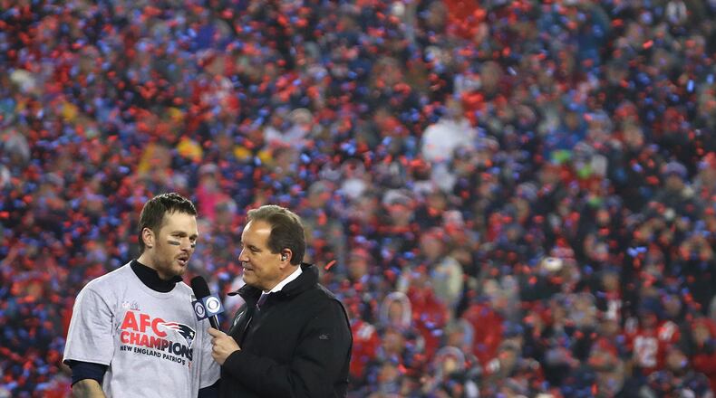 Jim Nantz interviews Tom Brady #12 of the New England Patriots after the Patriots defeated the Pittsburgh Steelers 36-17 to win the AFC Championship Game at Gillette Stadium on January 22, 2017 in Foxboro, Massachusetts.
