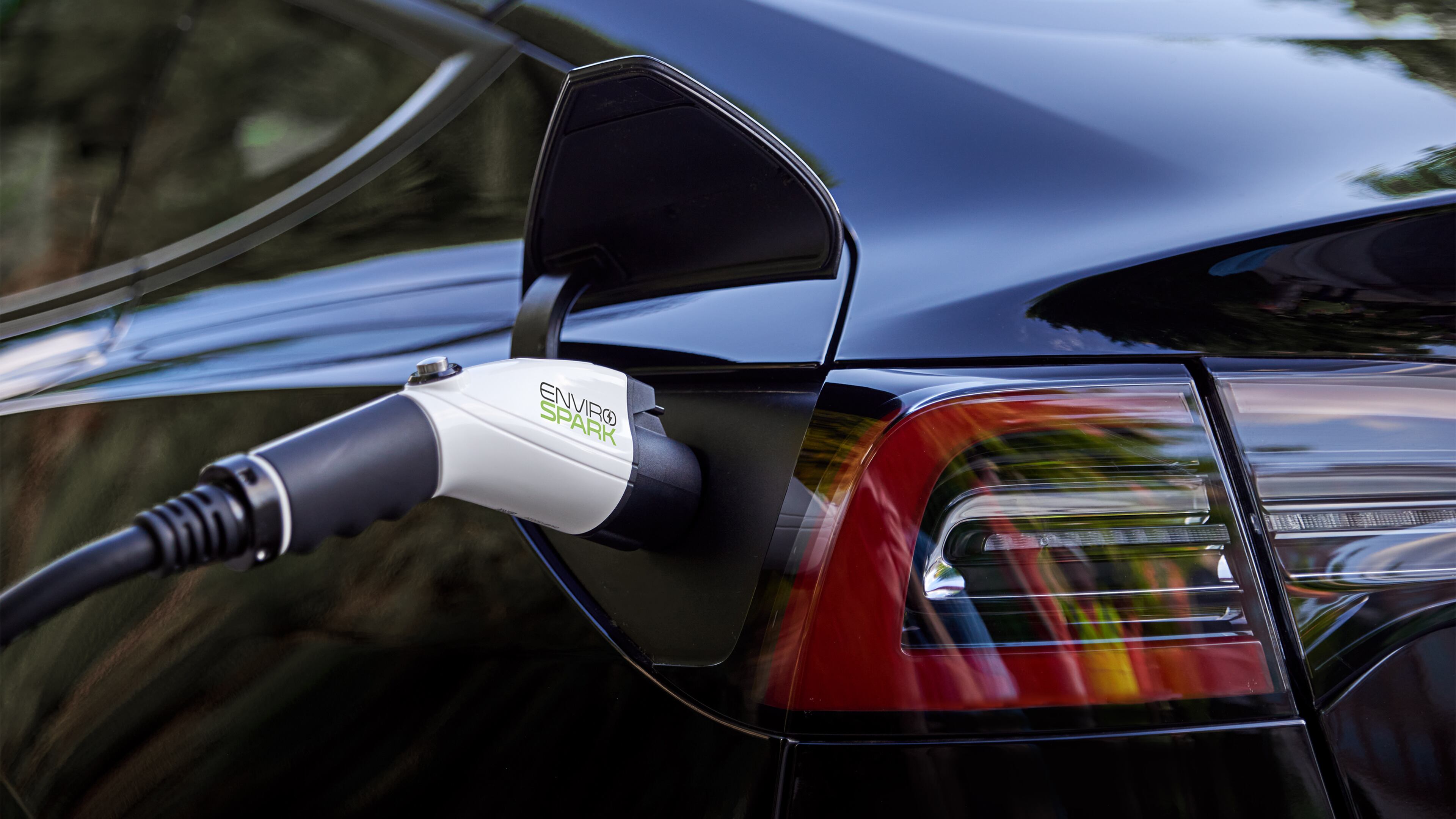 An EnviroSpark charger replenishes power to an electric vehicle. (Courtesy of EnviroSpark)
