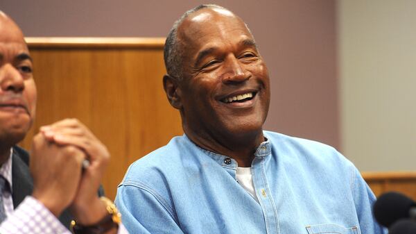 O.J. Simpson chuckles during his parole hearing at Lovelock Correctional Center July 20, 2017 in Lovelock, Nev.