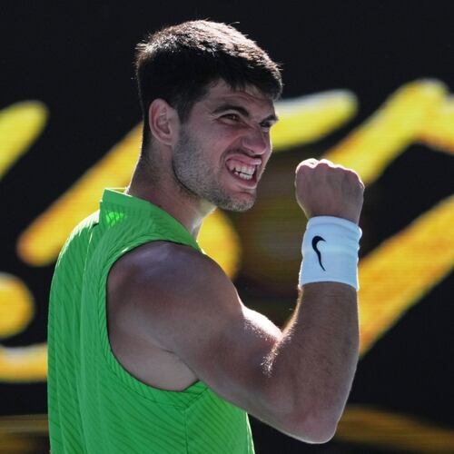 Carlos Alcaraz of Spain celebrates after defeating Yannick Hanfmann of Germany in their second round match at the Australian Open tennis championship in Melbourne, Australia, Wednesday, Jan. 21, 2026. (AP Photo/Dita Alangkara)