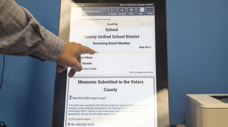 Gwinnett county elections officials will demonstrate the state’s new voting machines at 10 a.m. Feb. 1 at Pinckneyville Community Center, 4650 Peachtree Industrial Blvd. in Berkeley Lake. (AJC File Photo by Alyssa Pointer)