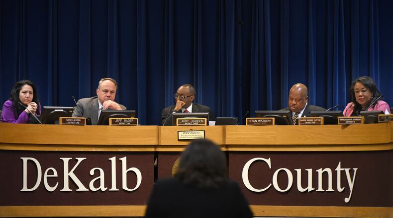 The DeKalb Commission voted Tuesday to hire John Greene as the county government’s financial watchdog. From left: Commissioners Nancy Jester, Jeff Rader, Larry Johnson, Stan Watson and Sharon Barnes Sutton. HYOSUB SHIN / HSHIN@AJC.COM