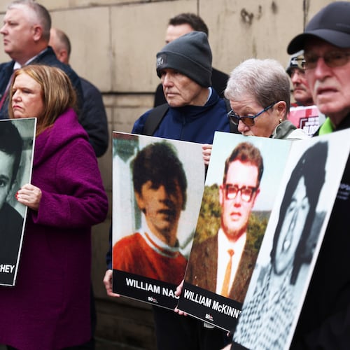 FILE - Families of the victims of the 1972 Bloody Sunday, hold a protest outside Belfast Crown court, Northern Ireland, Monday Sept. 15, 2025. (AP Photo/Peter Morrison, File)