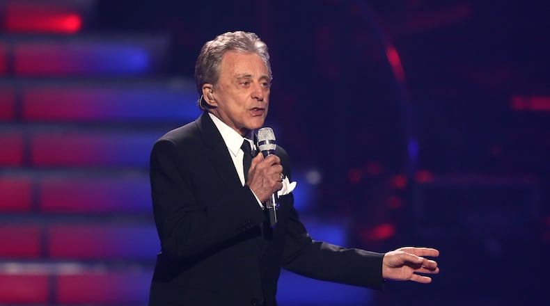 FILE - In this May 16, 2013 file photo, Frankie Valli performs at the "American Idol" finale at the Nokia Theatre at L.A. Live in Los Angeles. Valli, whose falsetto fuels The Four Seasons' music, will return to Broadway for seven shows from Oct. 21-29 at the Lunt-Fontanne Theatre. (Photo by Matt Sayles/Invision/AP, File)
