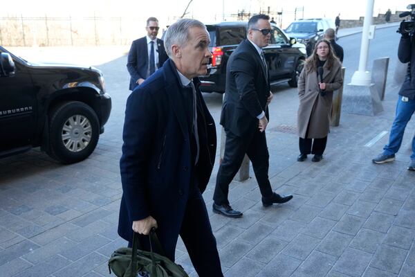Prime Minister Mark Carney arrives on Parliament Hill in Ottawa on Thursday, March 27, 2025. Carney will chair a meeting of the Cabinet Committee on Canada-U.S. Relations and National Security. (Frank Gunn /The Canadian Press via AP)