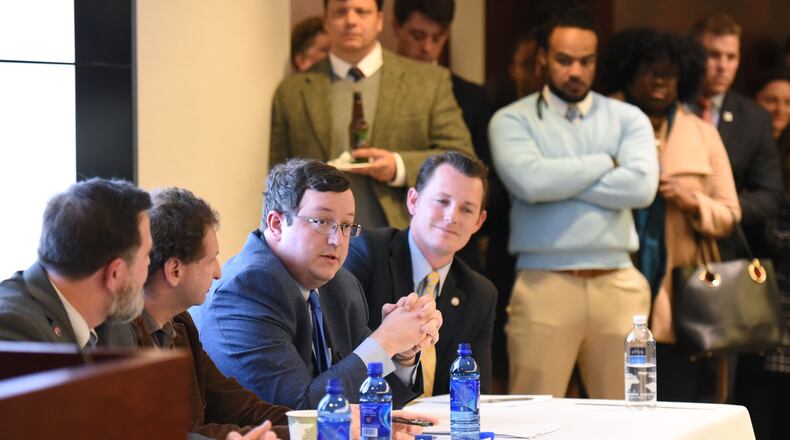 January 6, 2016 Atlanta - Panelists (from left) Jeff Graham (Executive Director, Georgia Equality), Alexander “Sasha” Volokh (Associate Professor of Law, Emory University School of Law), State Sen. Josh McKoon (R- District 29) and State Rep. Taylor Bennett (D- District 80) discuss during a discussion on the future prospects of the proposed Georgia Religious Freedom Restoration Act at Law office of Bondurant Mixson & Elmore in Atlanta on Wednesday, January 6, 2016. The Georgia chapter of the American Constitution Society hosted a discussion on the future prospects of the proposed Georgia Religious Freedom Restoration Act, and whether such legislation is necessary to protect religious freedom or merely provides a license for discrimination. HYOSUB SHIN / HSHIN@AJC.COM