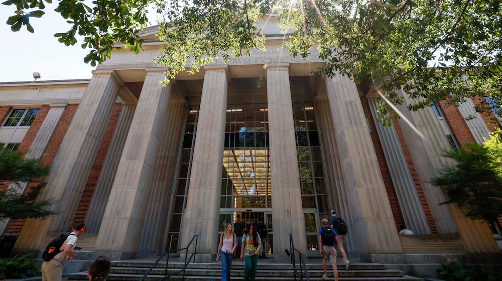 University of Georgia students are seen entering and leaving the main Library on the Athens campus on Monday, Sept. 8, 2025. (Miguel Martinez/AJC)