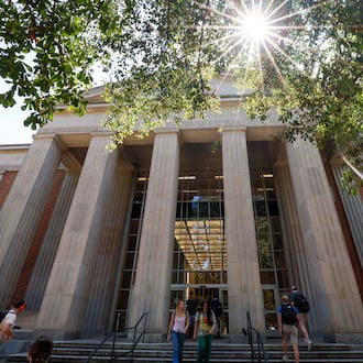 University of Georgia students are seen entering and leaving the main Library on the Athens campus on Monday, Sept. 8, 2025. (Miguel Martinez/AJC)