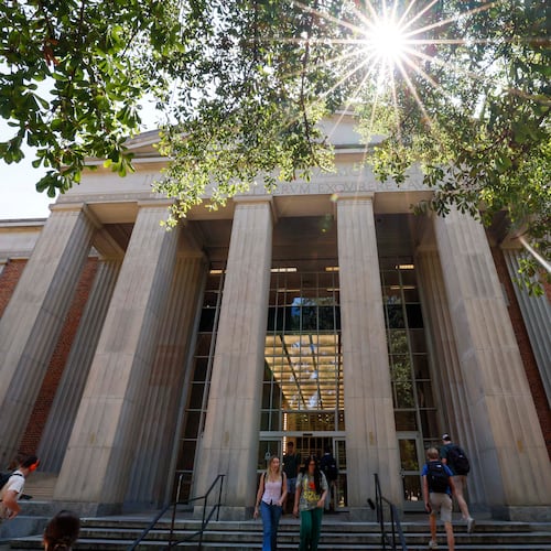 University of Georgia students are seen entering and leaving the main Library on the Athens campus on Monday, Sept. 8, 2025. (Miguel Martinez/AJC)