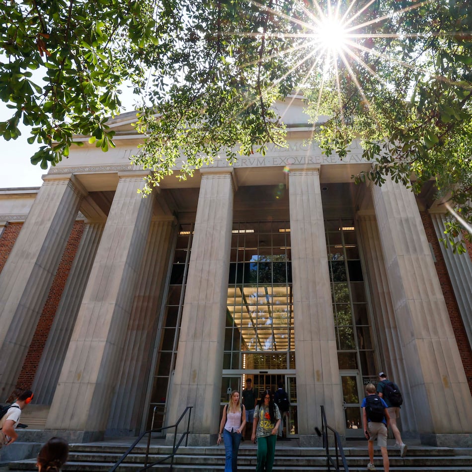 University of Georgia students are seen entering and leaving the main Library on the Athens campus on Monday, Sept. 8, 2025. (Miguel Martinez/AJC)