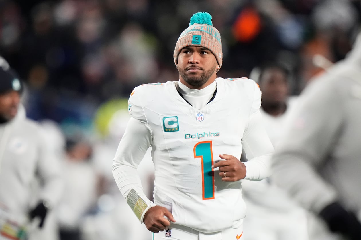 Miami Dolphins quarterback Tua Tagovailoa runs off the field during the first half of an NFL football game against the New England Patriots in Foxborough, Mass., Jan. 4, 2026. (Robert F. Bukaty/AP file)