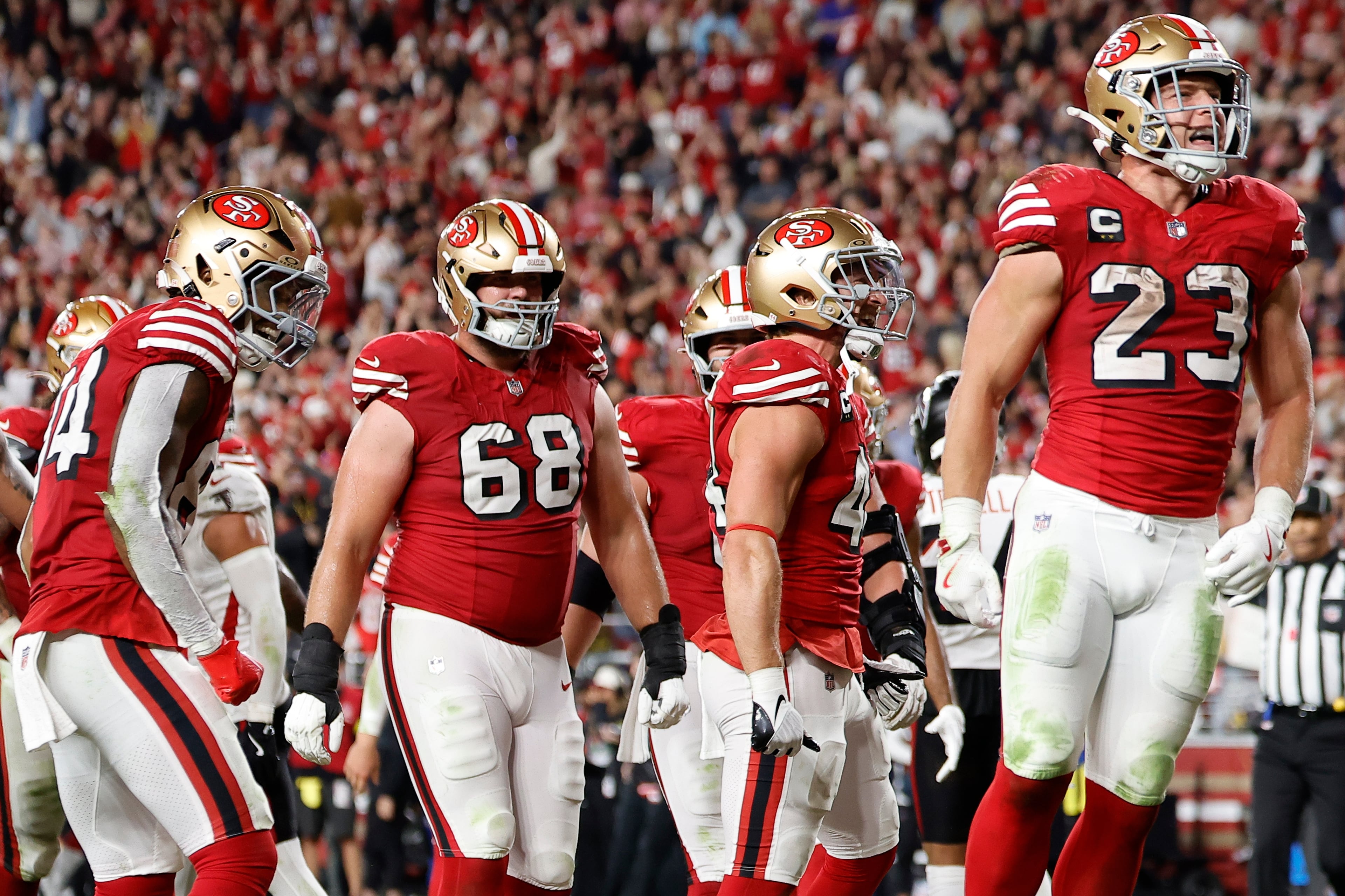 San Francisco 49ers running back Christian McCaffrey (right) celebrates his touchdown against the Atlanta Falcons during the second half on Sunday, Oct. 19, 2025, in Santa Clara, Calif. (AP Photo/Kelley L Cox)