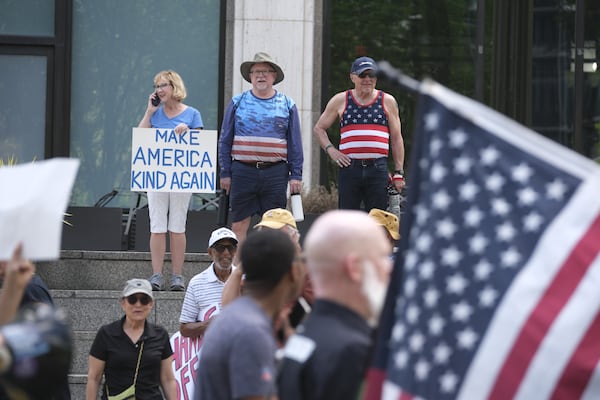 Protestors march for the "Hands Off Rally" in Atlanta. Participants started in Piedmont Park to march to the Capitol in one of hundreds of rallies planned across the country on Saturday, April 5, 2025. (Ben Gray for The Atlanta Journal-Constitution)