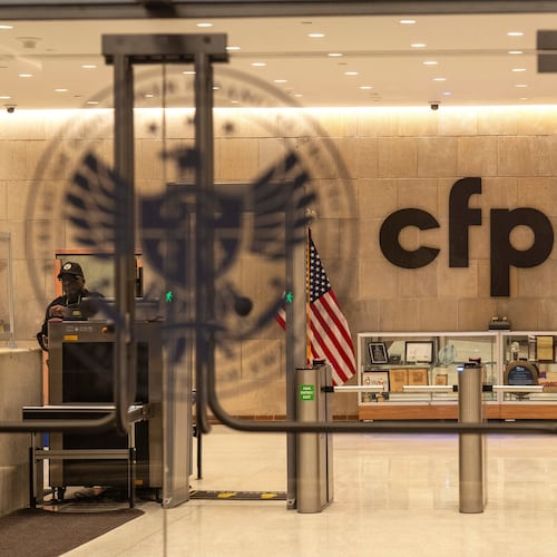 FILE - A security officer works inside of the Consumer Financial Protection Bureau (CFPB) building headquarters, Feb. 10, 2025, in Washington. (AP Photo/Jacquelyn Martin, File)